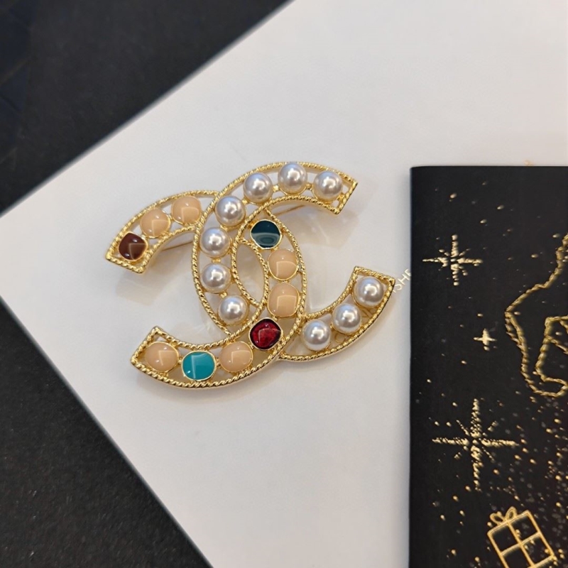 Ch**el brooches
